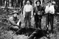 Hunters With Bear