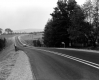 Car on Paved Road
