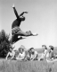 Students Watch a Dancer Jump