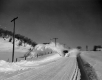 Snow Plow On Rural Road