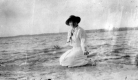 Woman by shore