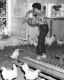 Woman Sharing a Moment With a Chicken