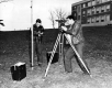 Students Surveying in Front of Hills Building