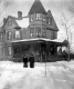 House with People in Snow