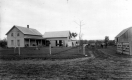 Farm Along a Dirt Road