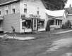 A Muddy Street Next to "Pittsburgh Paints"