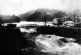 Dam and Bridge During Flood