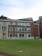 Woman Lecturing by Terrill Hall
