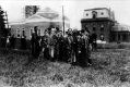 A Group of Men In Coats on Campus