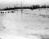 Snow Banks Beside a Road