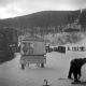 Skiers in Line for a Chair Lift