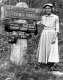 Elderly Woman at Junction Signs Along the Long Trail