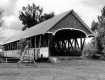 Covered Bridge with a Swing in the Foreground