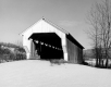Covered Bridge Surrounded by Snow