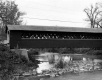 Covered Bridge with Boulders Below