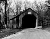 Covered Bridge with a Dirt Road in the Foreground