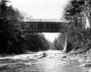 Covered Bridge Above a River