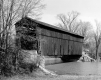 Covered Bridge Over a Calm River