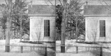 Building and Wooden Fence in Bellows Falls