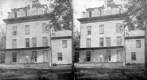 Family Standing on a Front Porch