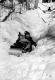 Sledding in the Woods