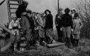 Dr. Will S. Monroe and group at the base of a lookout tower