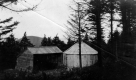 Wooden lean-to and circular structure on Killington