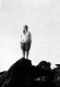 Hiker at the summit of Camel's Hump