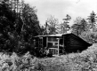 Three men outside Cooley Glen Shelter