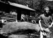 Steve Keough and two others in front of Taylor Lodge
