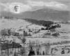 Snowy hillside and young girl's face