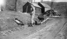 Dan Garland clearing a dirt road
