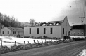 Burned church on winter day