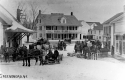 Horse drawn sleighs in front of the Caspian Lake House