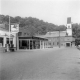 Gas station and Pontiac, Chevrolet and Cadillac dealership on Gates Street