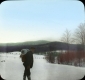 Hiker in Snowy Field