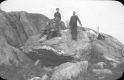 Four Men on Boulder on Summit