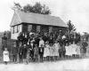 Townspeople Posing in Front of Building
