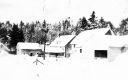 Snow-covered Houses and Trees
