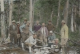 Hikers cooking around stone pit