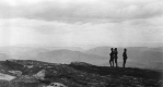Three Men on Top of Mountain