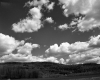 Clouds Above a Rolling Hill Landscape
