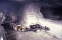 Two Men Drilling Marble with Vehicle Behind them #2