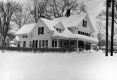 White House with gables during snow storm