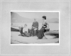 Two Women and a Man on a Boat Landing