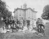 Group Posed in Front of Stone Building
