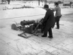 Two Men Cutting Ice