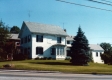 White wooden-framed home