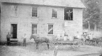Carriages in front of Building