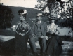 Three People Dressed Formally at Lake Dunmore